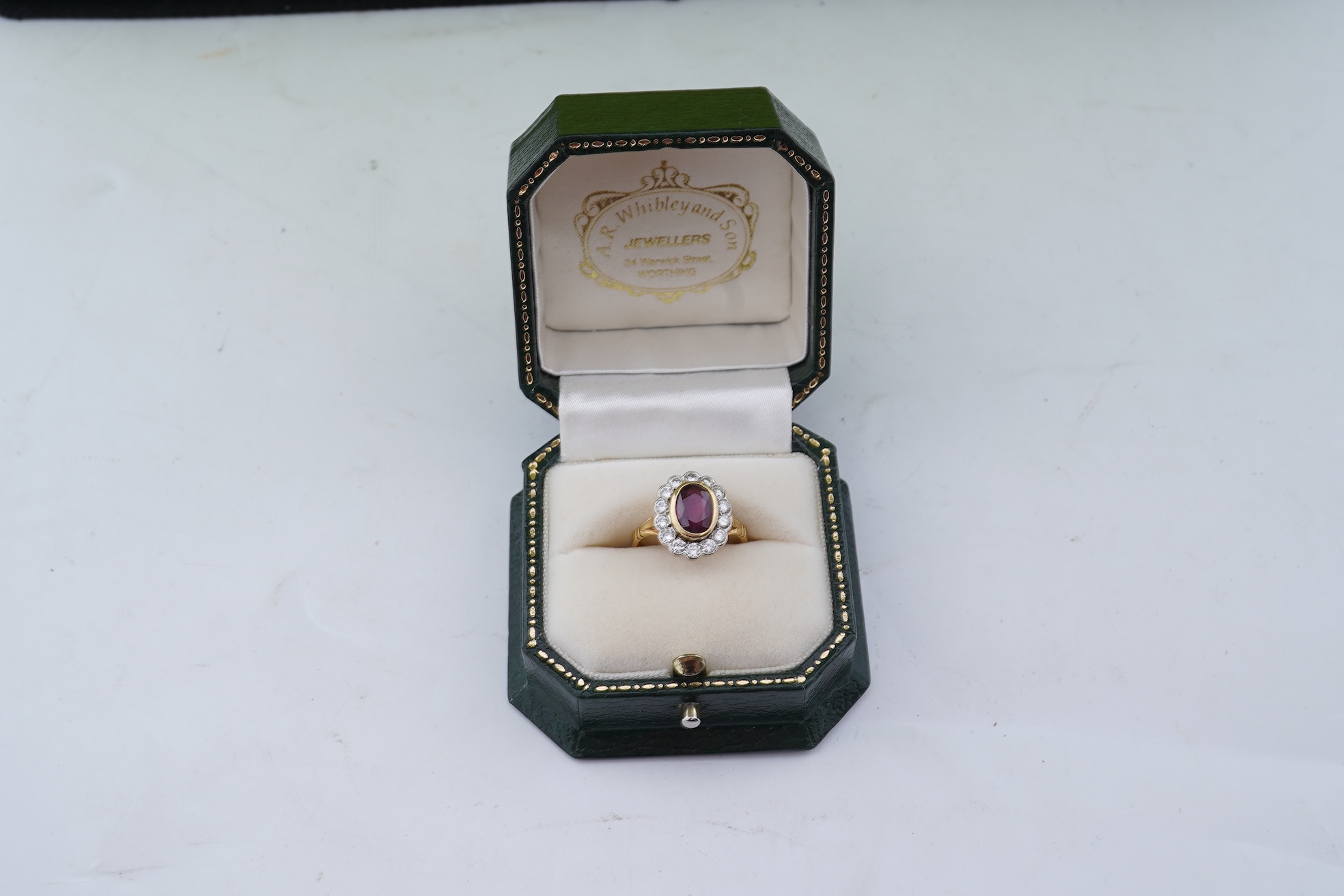A ruby and diamond cluster ring